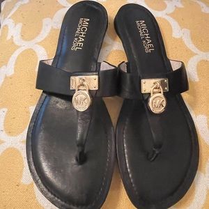 Michael Kors flat sandals, size 5, good condition.